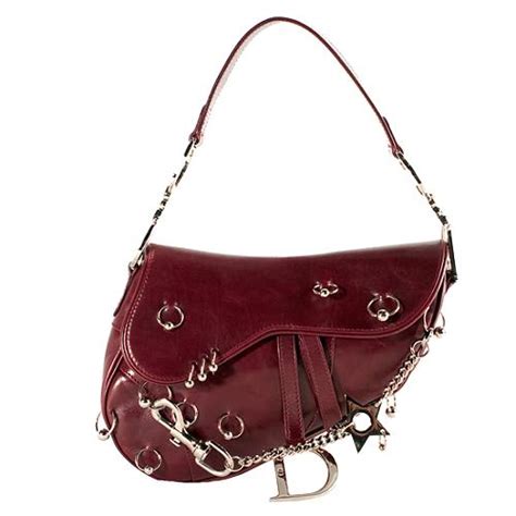 dior saddle bag pierced